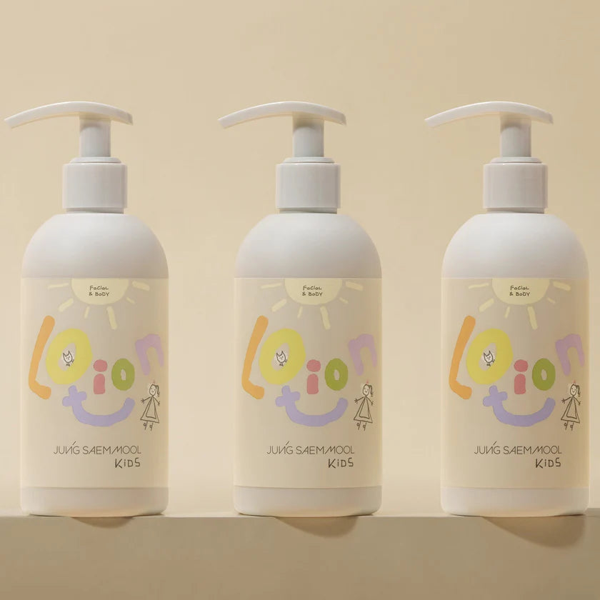 Three bottles of 'Lotion' by JUNG SAEMMool Kids on a beige background