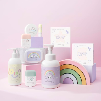 Children's skincare products with rainbow designs on a pink background