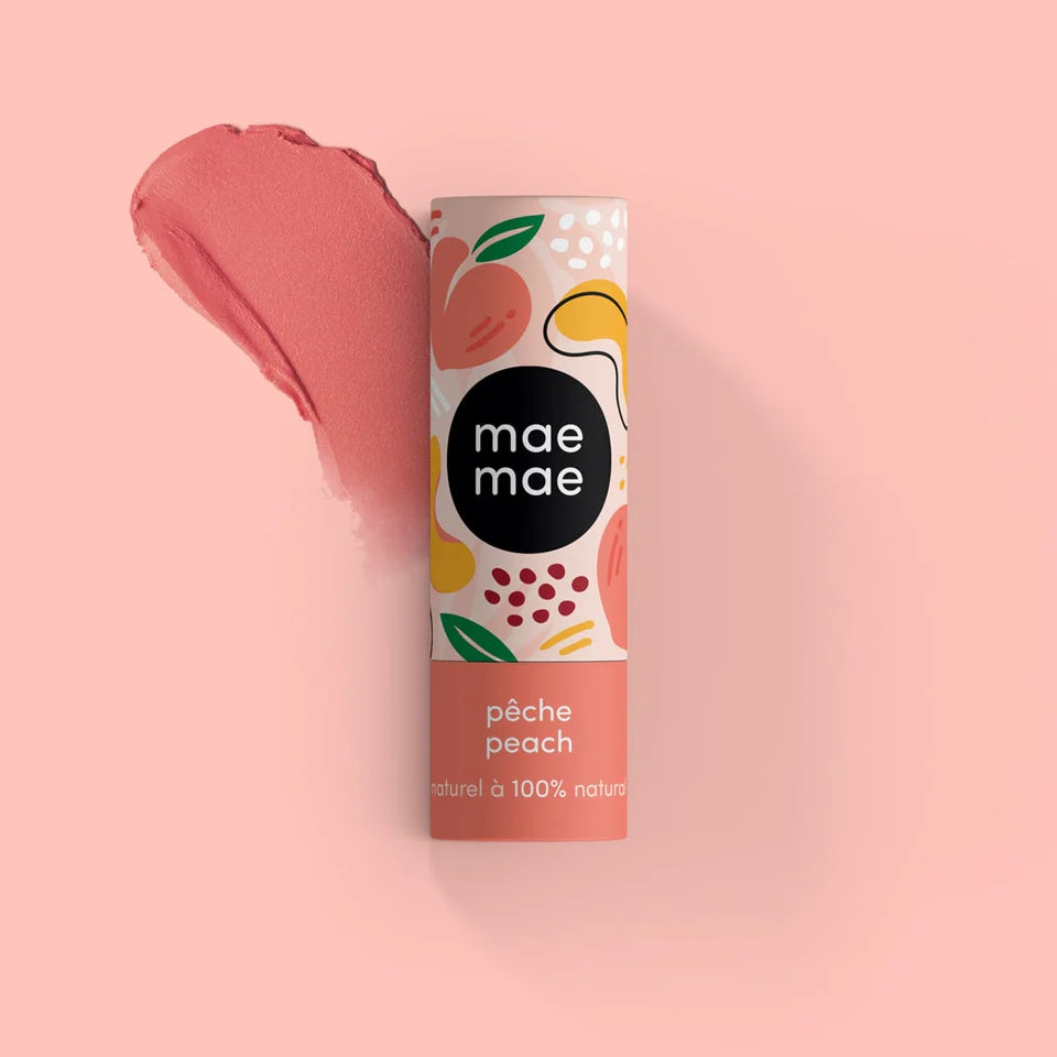 Lip balm packaging with 'mae mae' branding and peach flavor text on a white background