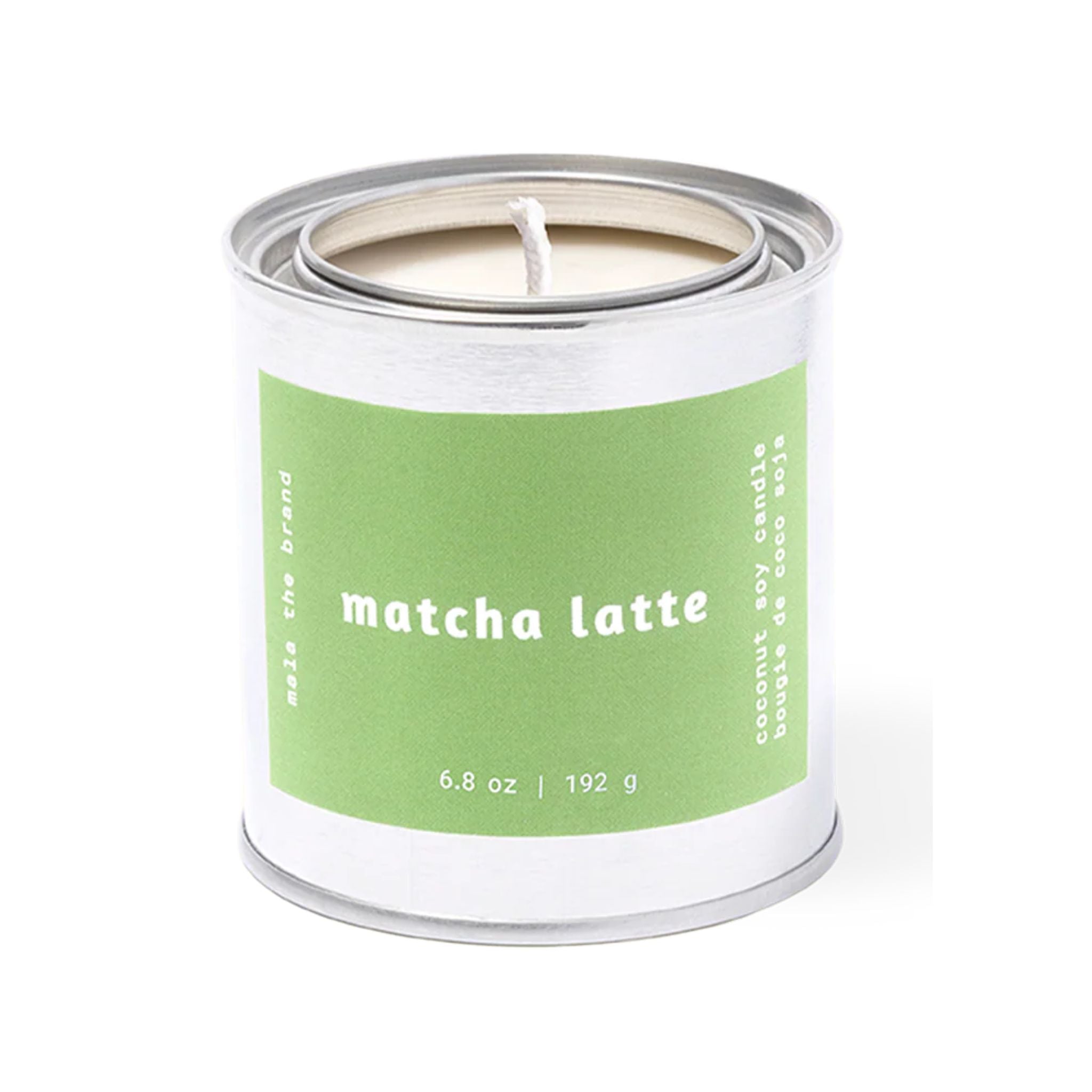 Candle in a tin labeled 'matcha latte' on a white background