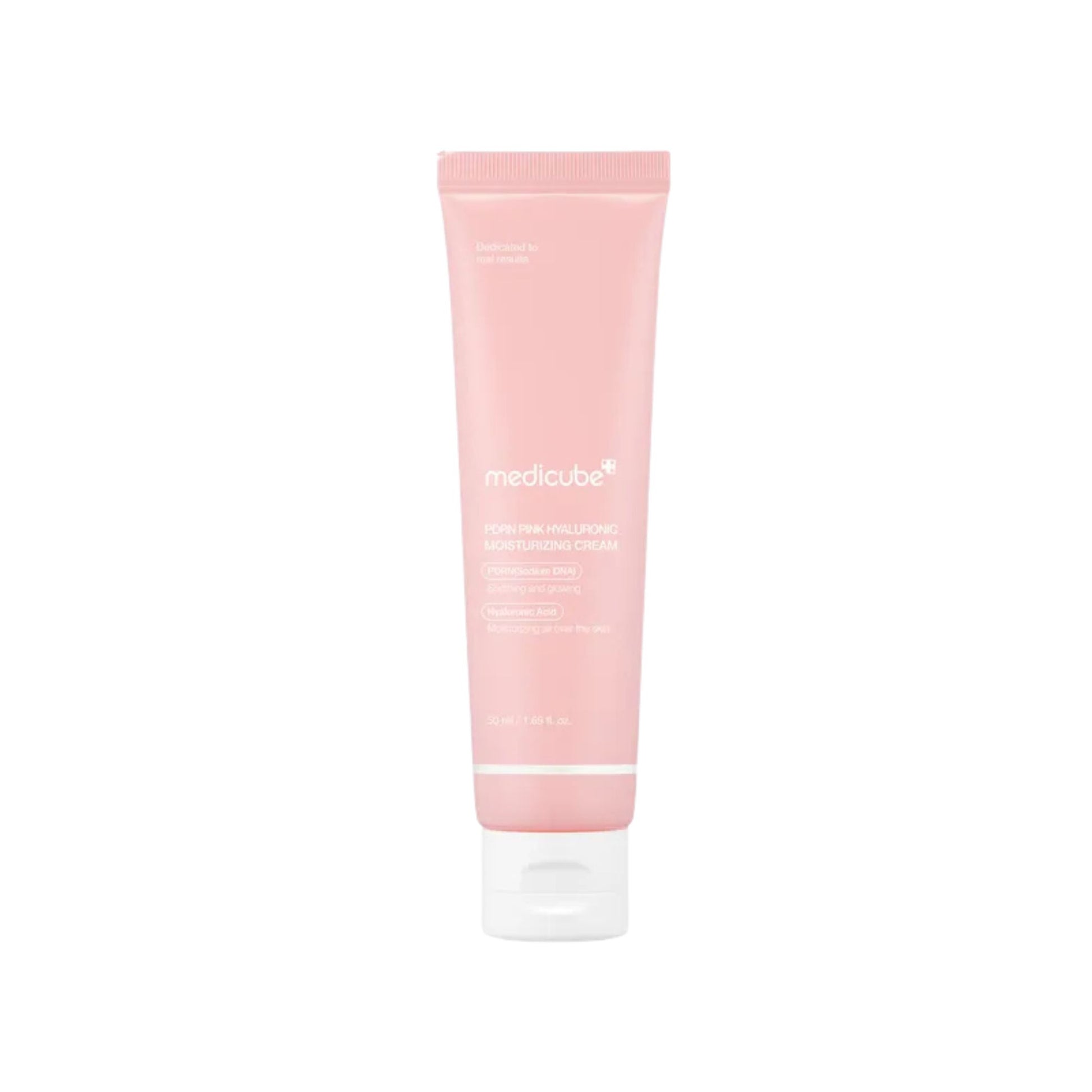 Pink tube of Medicube product on a white background
