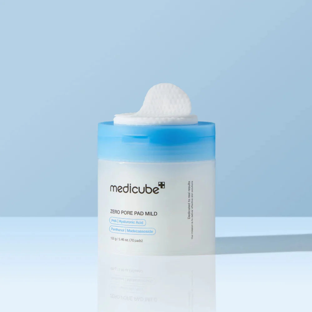 Medicube Zero Pore Pad Mild on a light blue background