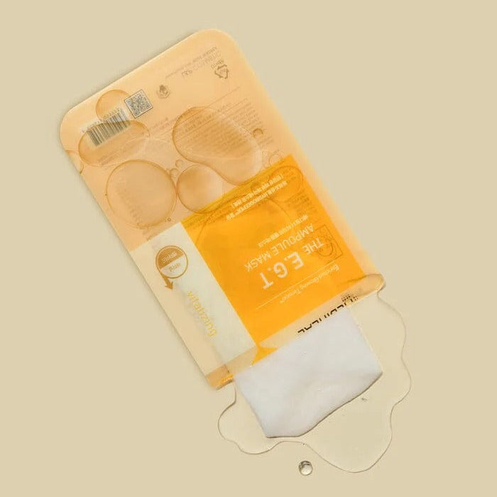 Packaged eye patches with a beige background