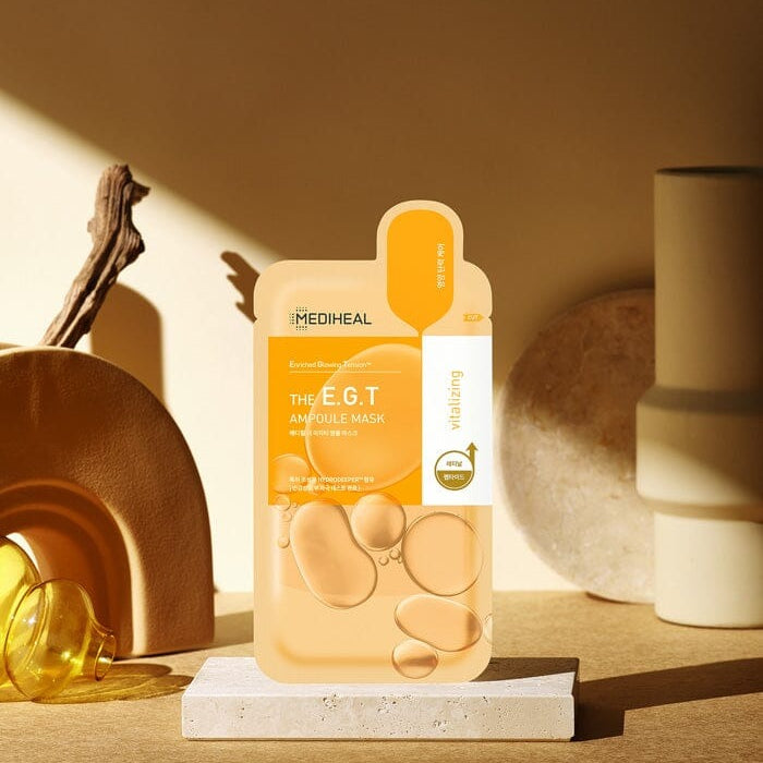 Mediheal skincare product on a wooden surface with decorative items