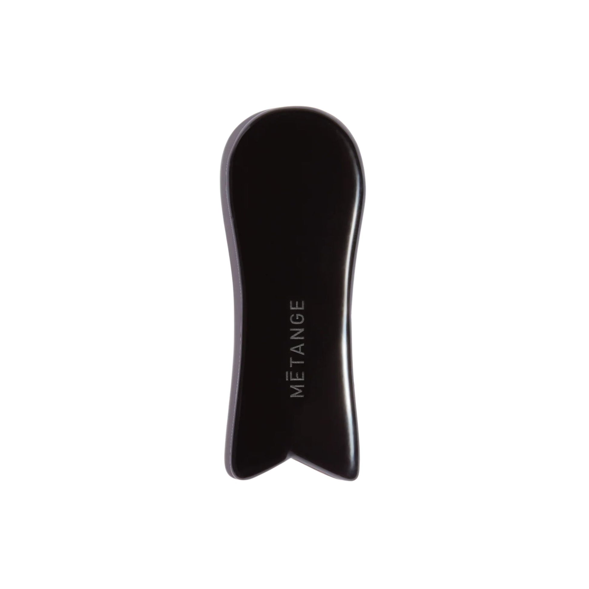 Black gua sha tool with 'METANGE' branding on a white background