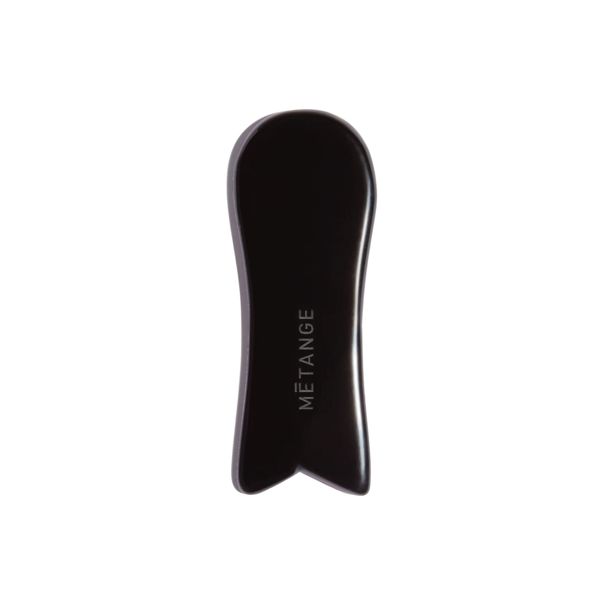 Black gua sha tool with 'METANGE' branding on a white background
