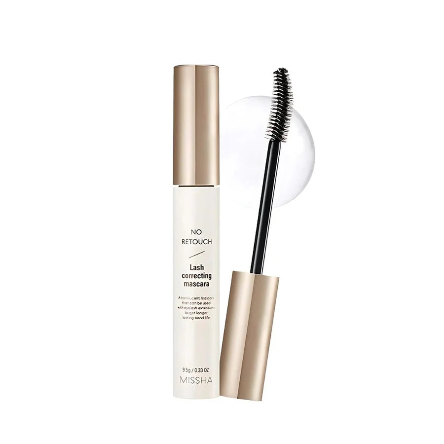Mascara with gold and white packaging on a white background