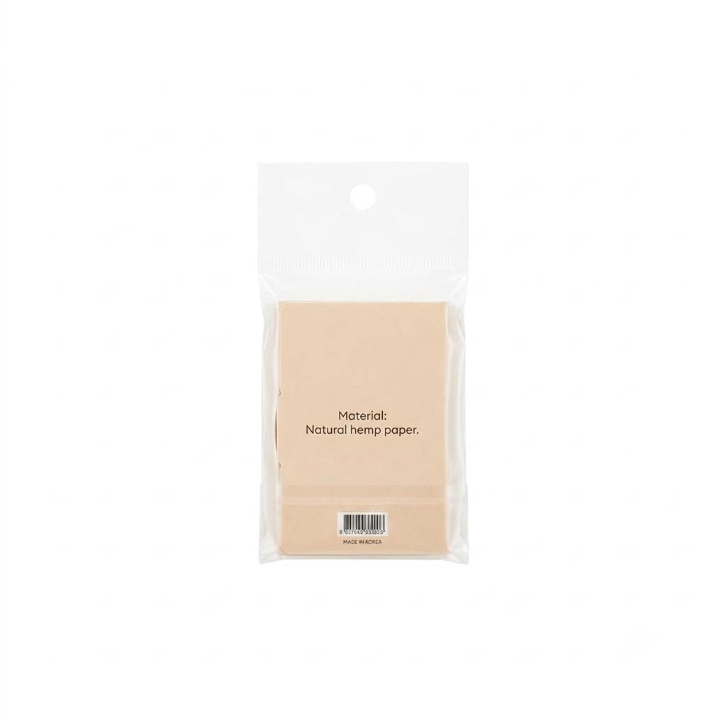 Natural hemp paper pads in a clear plastic hanging pouch with a printed label reading 'Material: Natural hemp paper.' on a white background.