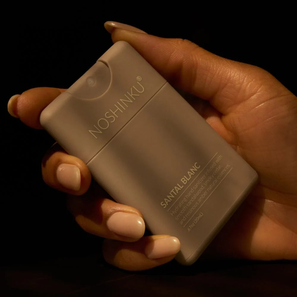 Close-up of The Pharmacy Lab Noshinku Santal Blanc Pocket Sprayer compact hydrating hand sanitizer for on-the-go everyday use