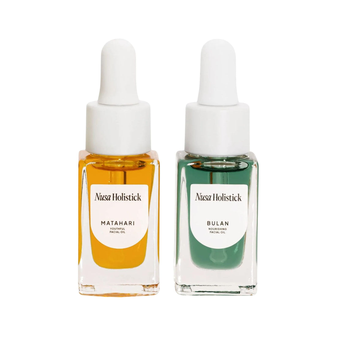 Two Nusa Holistic skincare dropper bottles, one orange and one green, on a white background.