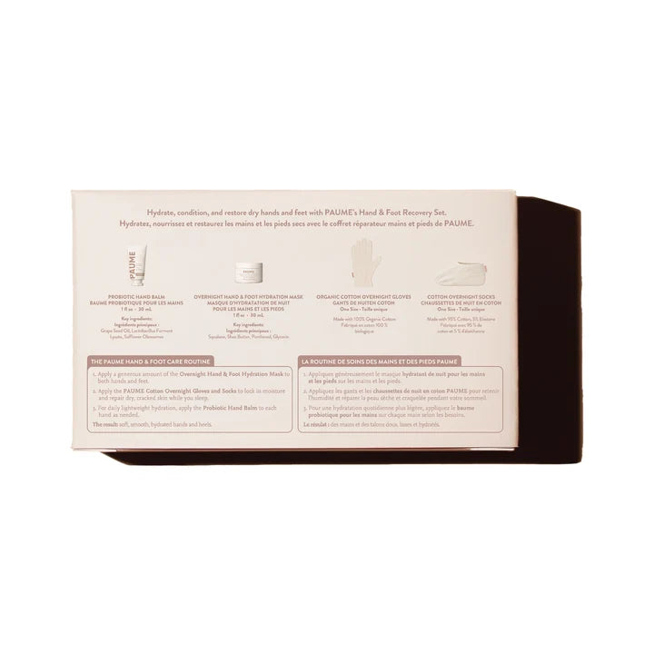 The back of a pale pink product box with printed instructions and small illustrations, shown on a dark brown surface against a white background.