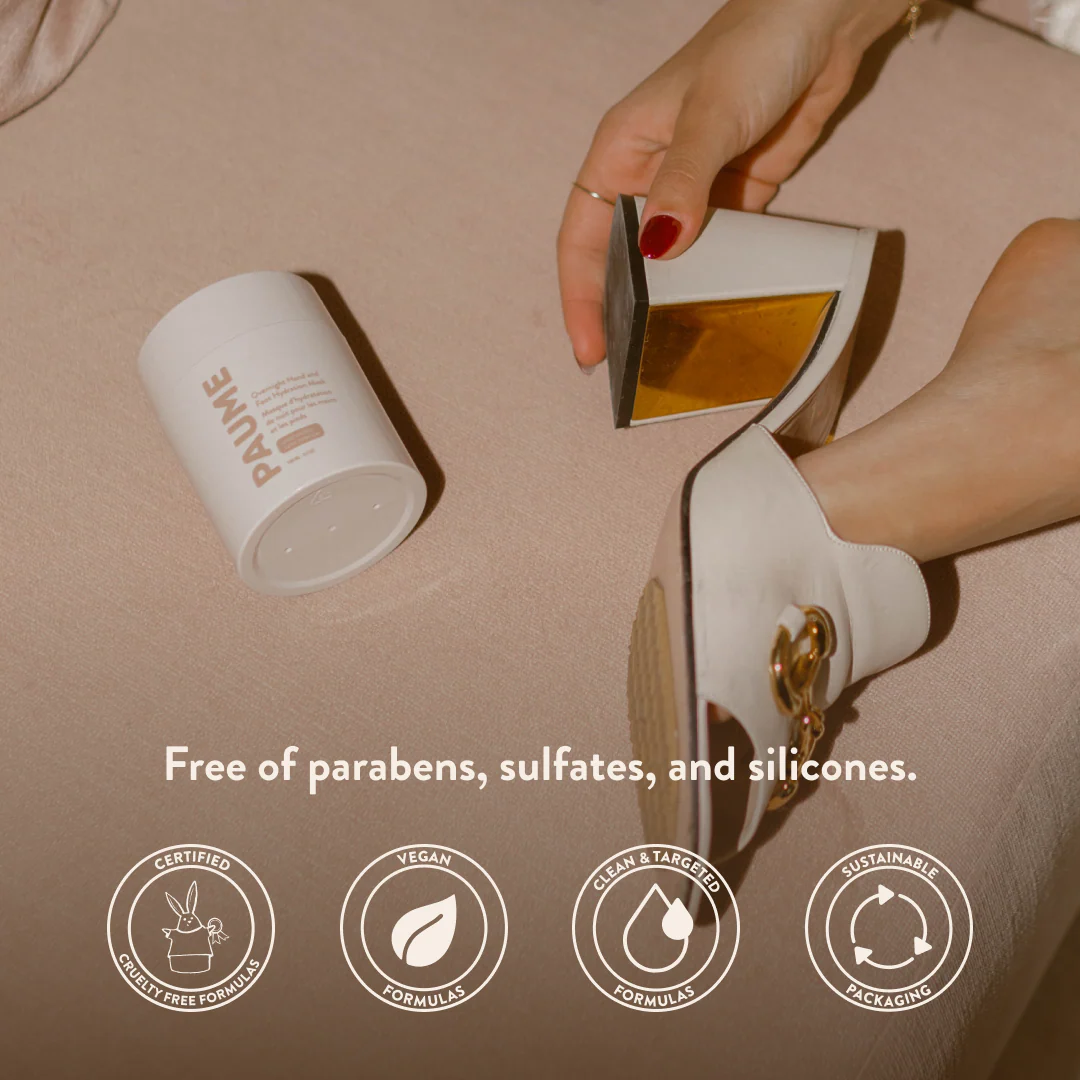 Woman applying cream to her heel with a jar labeled 'PAUME' on a beige background, featuring sustainability icons.