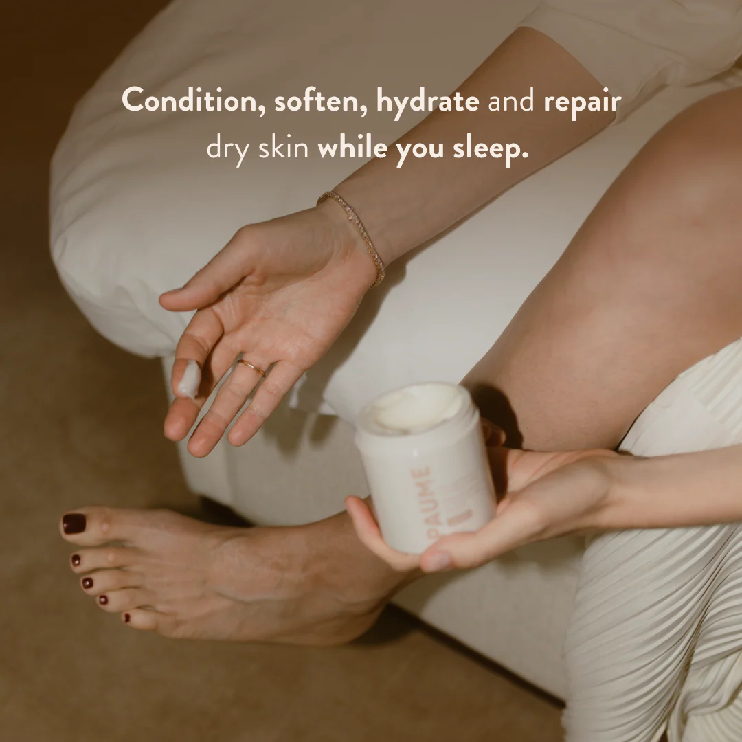Person holding a jar of skincare product with text about skin care benefits.