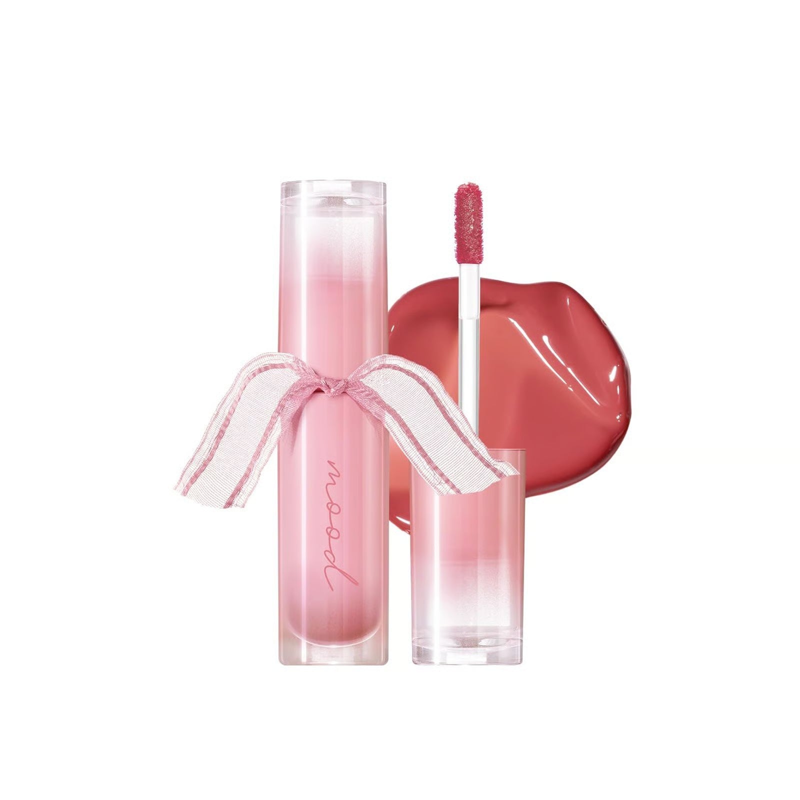 Pink makeup product with a ribbon on a white background