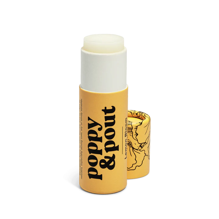 Lip balm with 'Poppy & Pout' branding on a white background