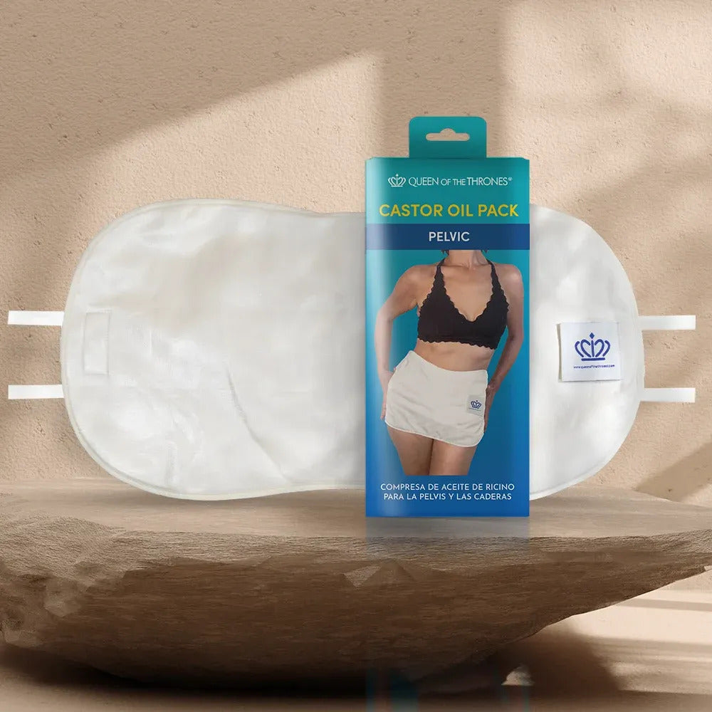 Packaging of a castor oil pack for pelvis and hips with a person model on a white background.