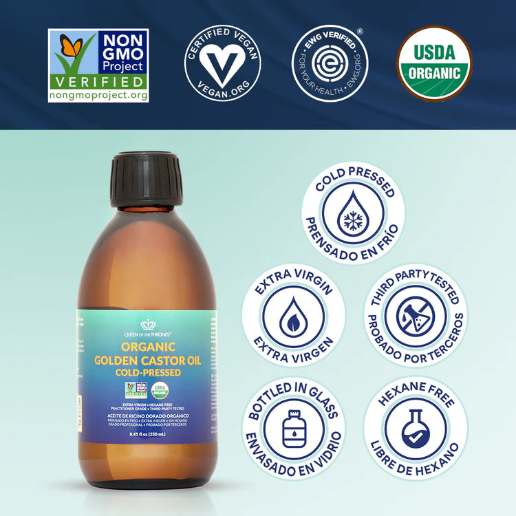 Bottle of organic golden castor oil with certification logos on a blue background