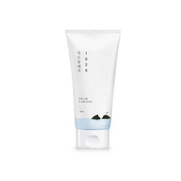 White skincare product tube with blue label on a white background