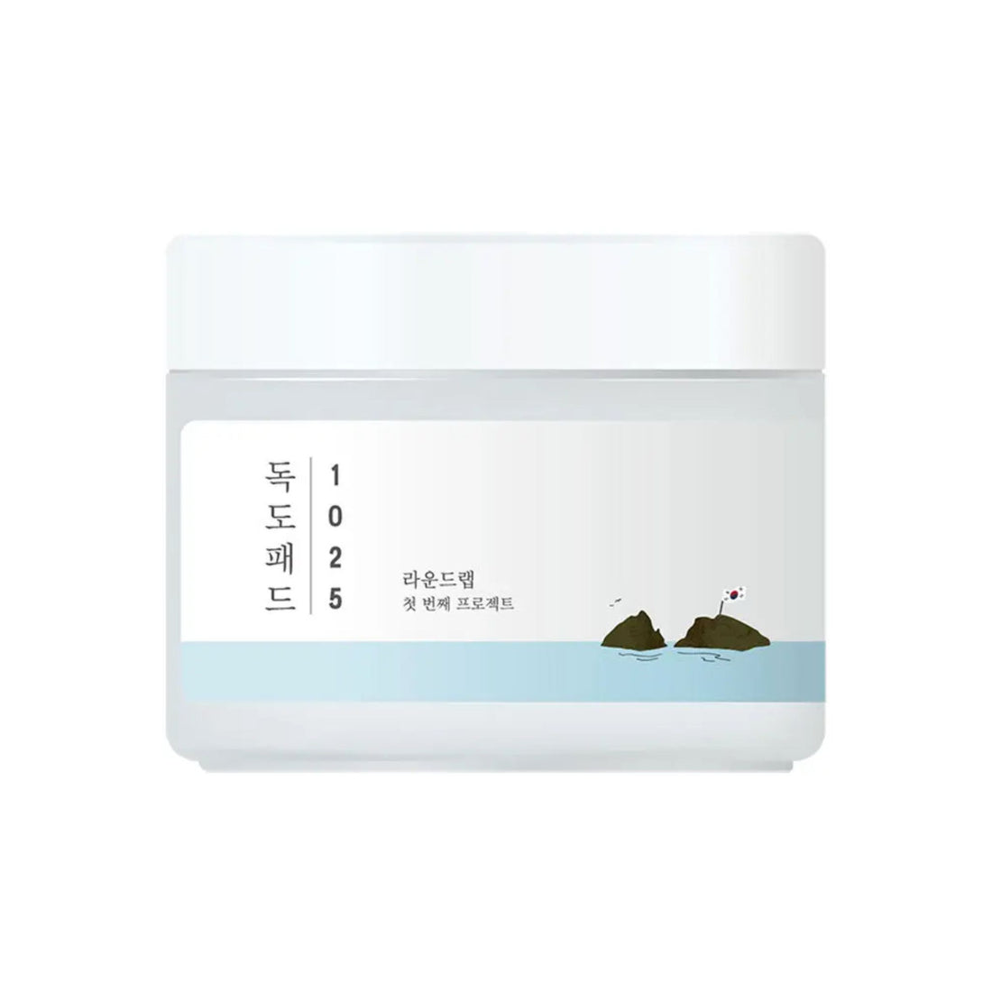 White jar with a label featuring text and a small illustration on a white background