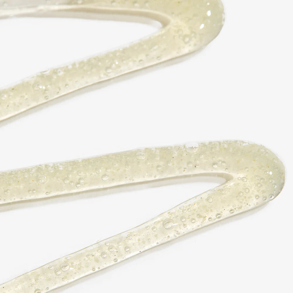 Brown bottle with black cap labeled 'SIDIA' on a white background