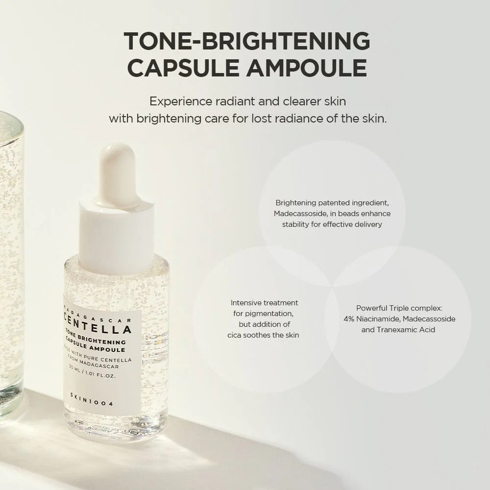 Skincare bottle with dropper labeled 'Tone-Brightening Capsule Ampoule' on a light background