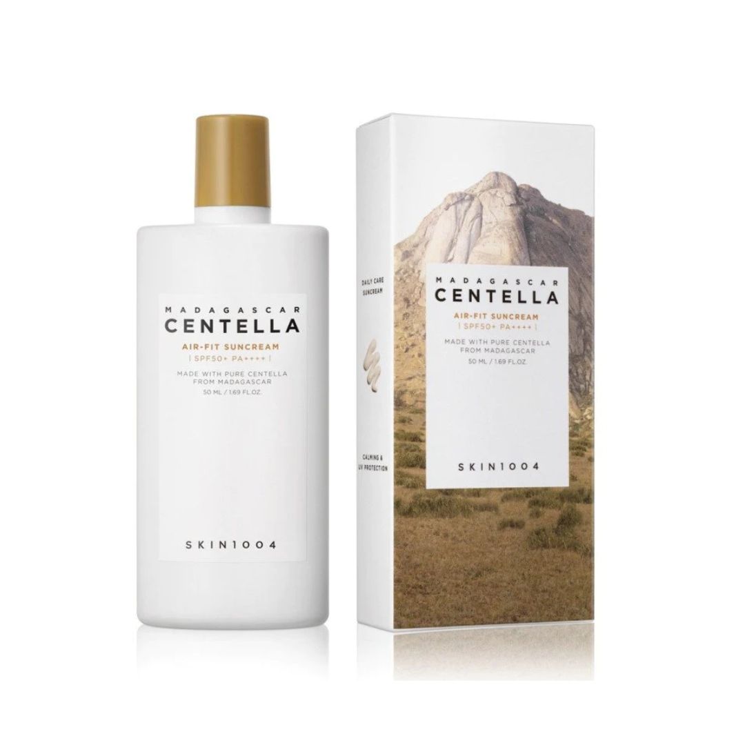 White bottle with gold cap labeled 'Madagascan Centella' on a white background