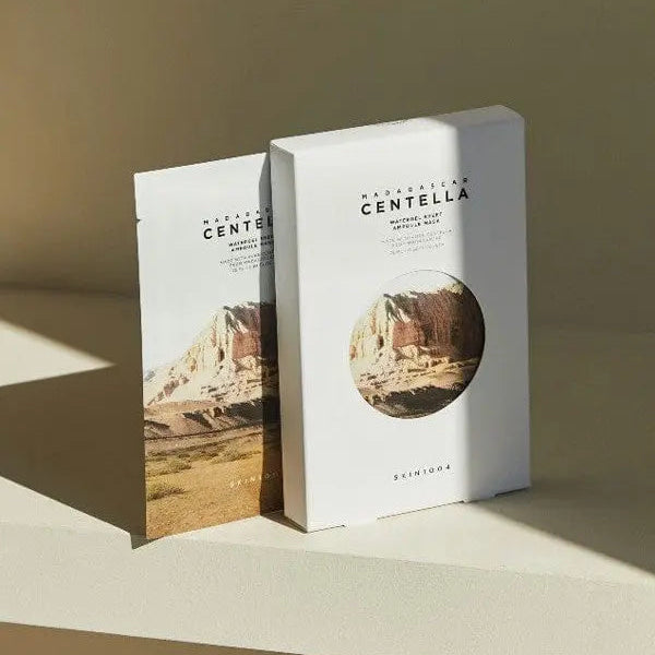 Two boxes of Madagascan Centella Skinfood product on a neutral background