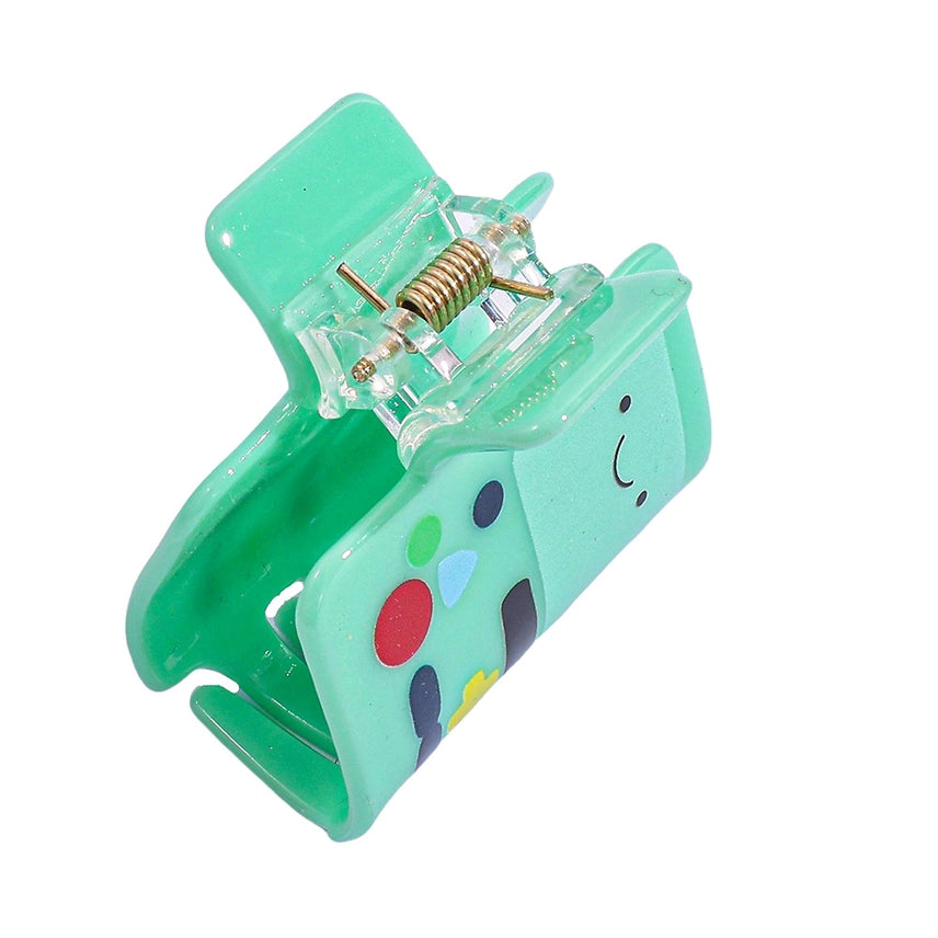 Green mousetrap with colorful design on a white background