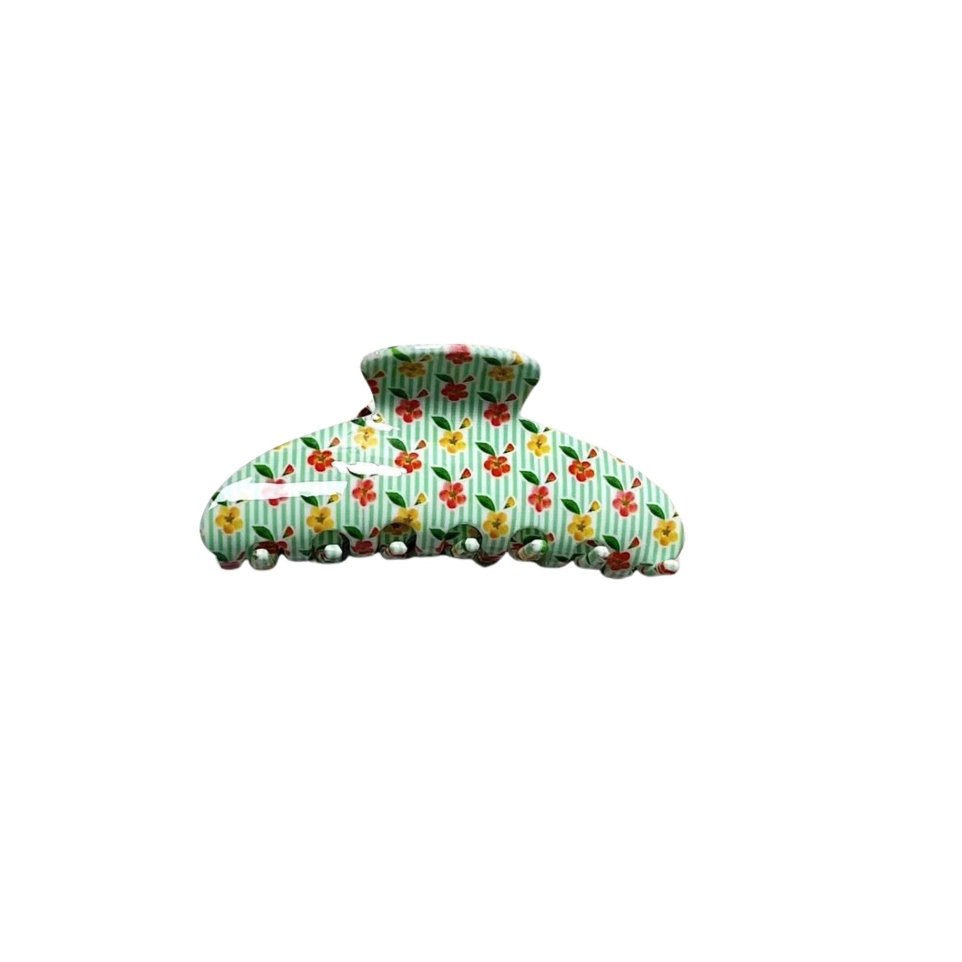 Floral patterned hair clip on a white background