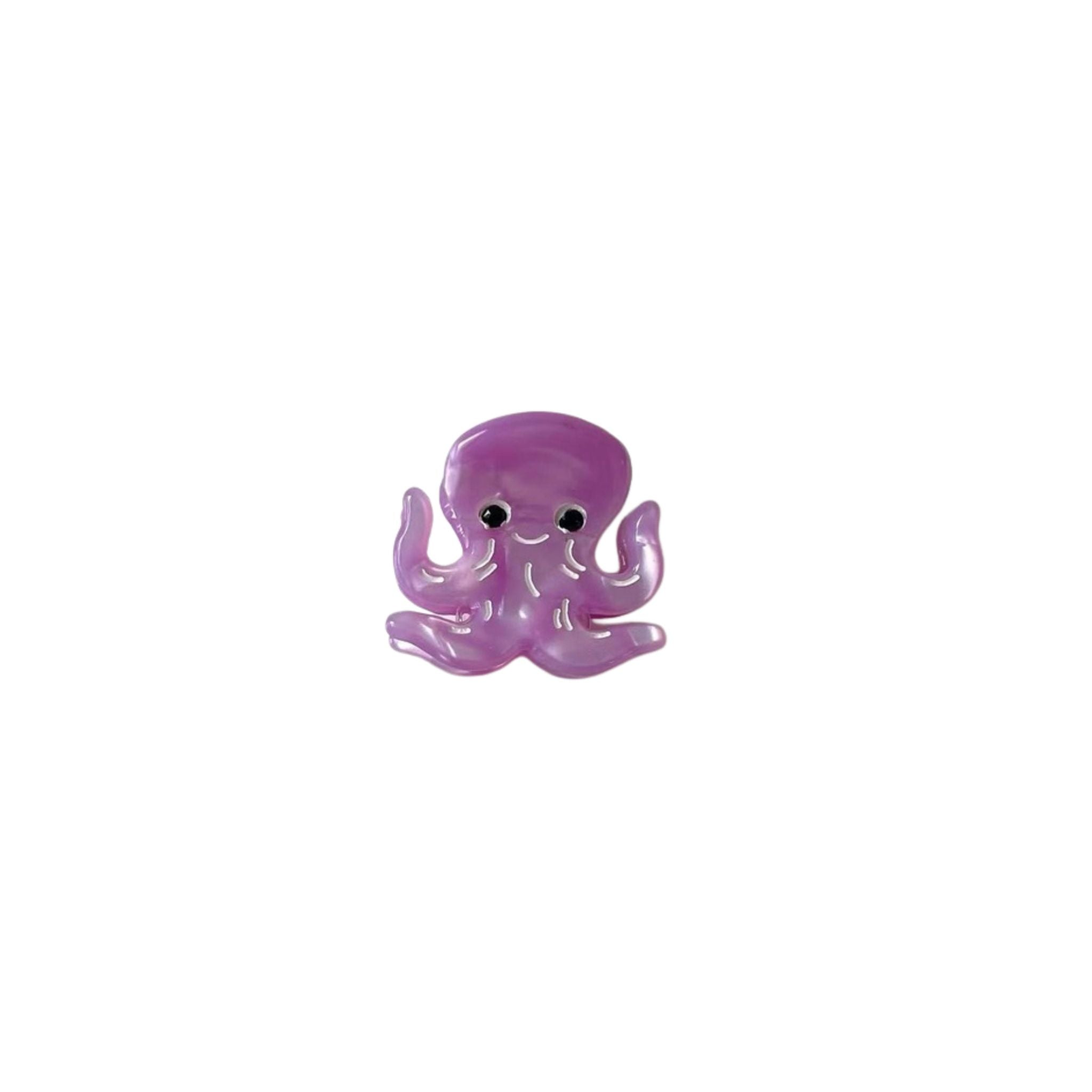 Purple octopus toy on a white background