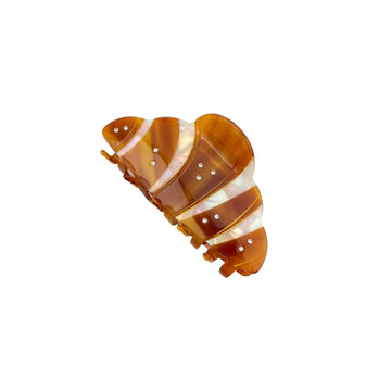 Decorative object resembling a striped shell on a white background