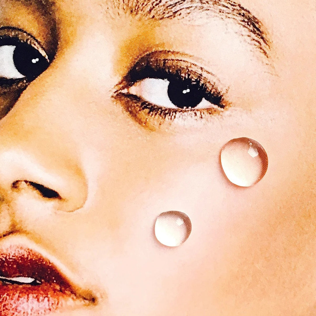 TAHNYC Contour Peptide Serum in a pink glass bottle with a crystal-style cap against a white background.