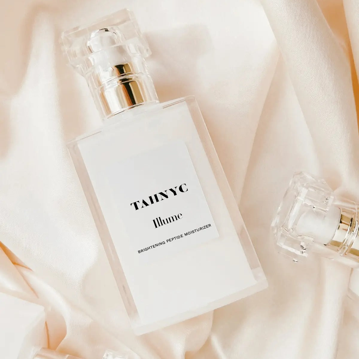 TAINYC skincare product on a soft fabric background