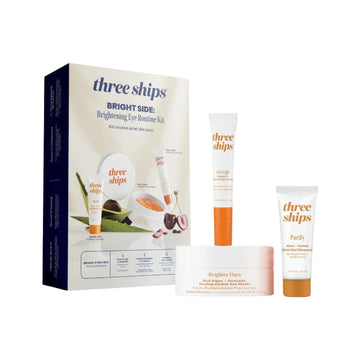 Three Ships skincare product set with packaging on a white background