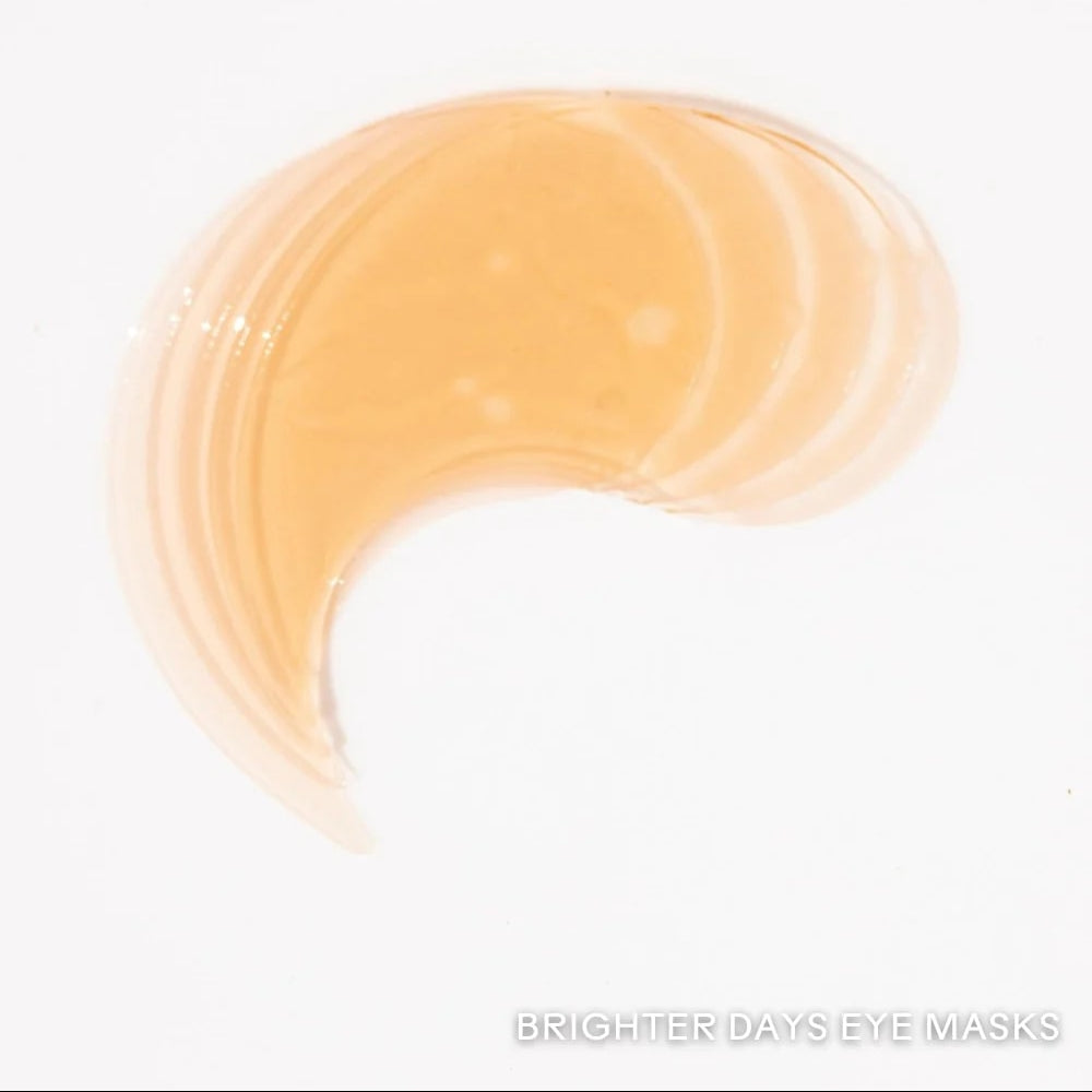 Amber-colored eye mask with 'Brighter Days Eye Masks' text on a white background