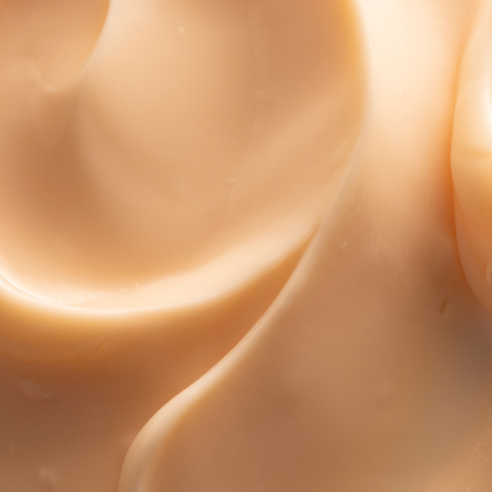Close-up of smooth, beige cream texture