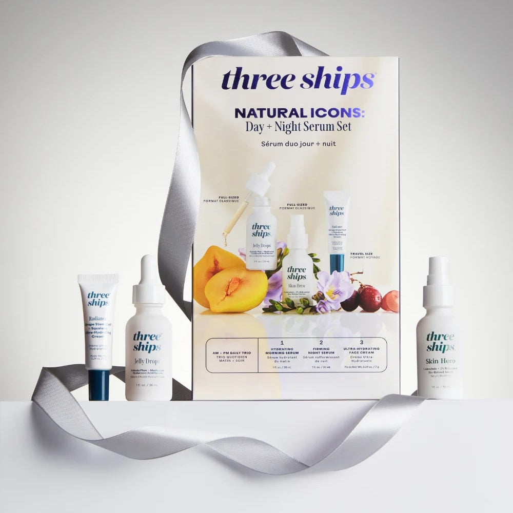 Three Ships skincare product set with packaging on a gray background