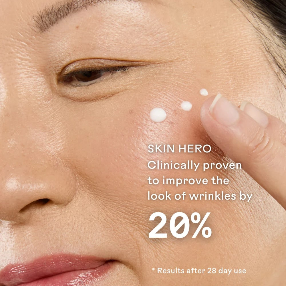 Close-up of a person applying cream to their face with text about skincare product efficacy.