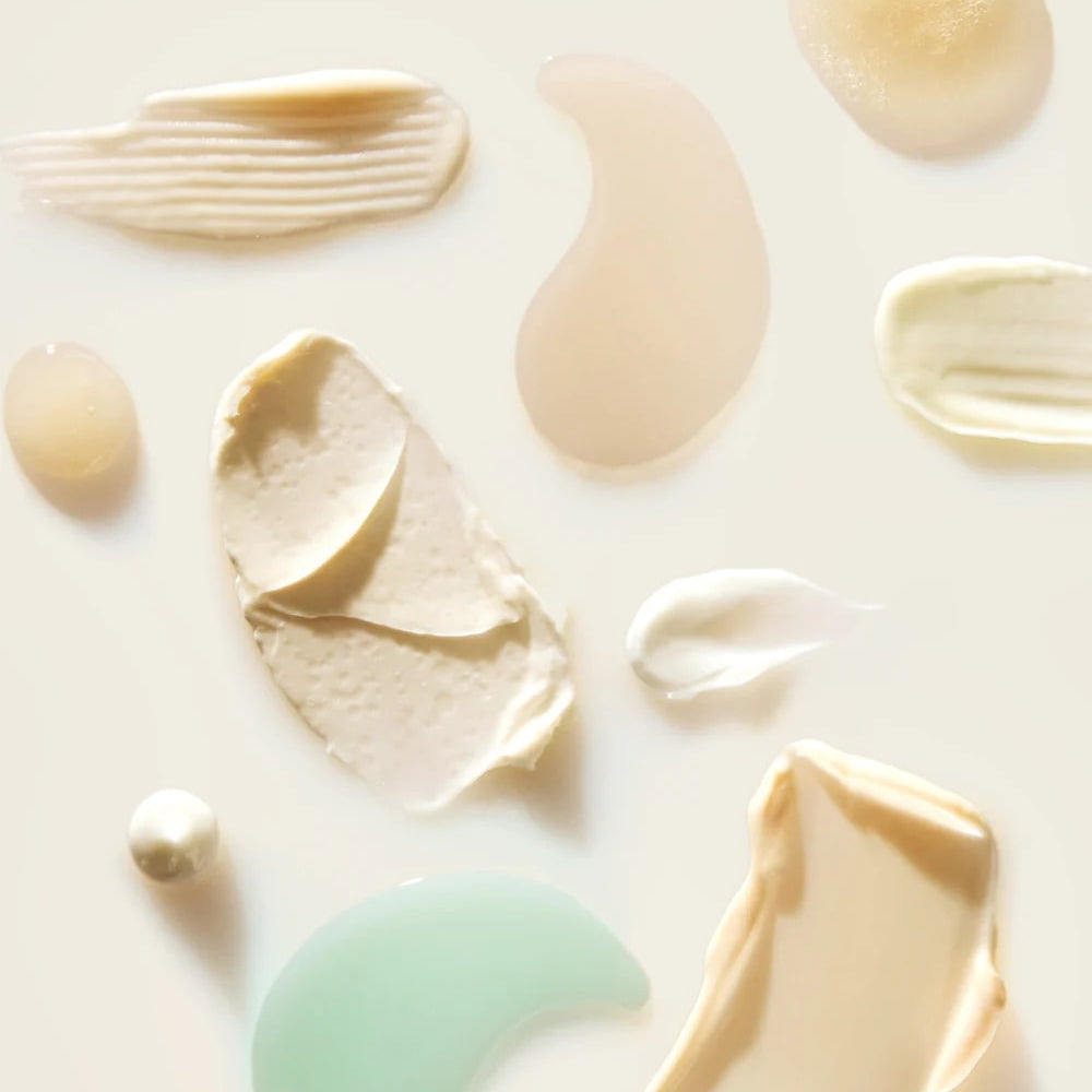 Various textures of cream or lotion on a light background