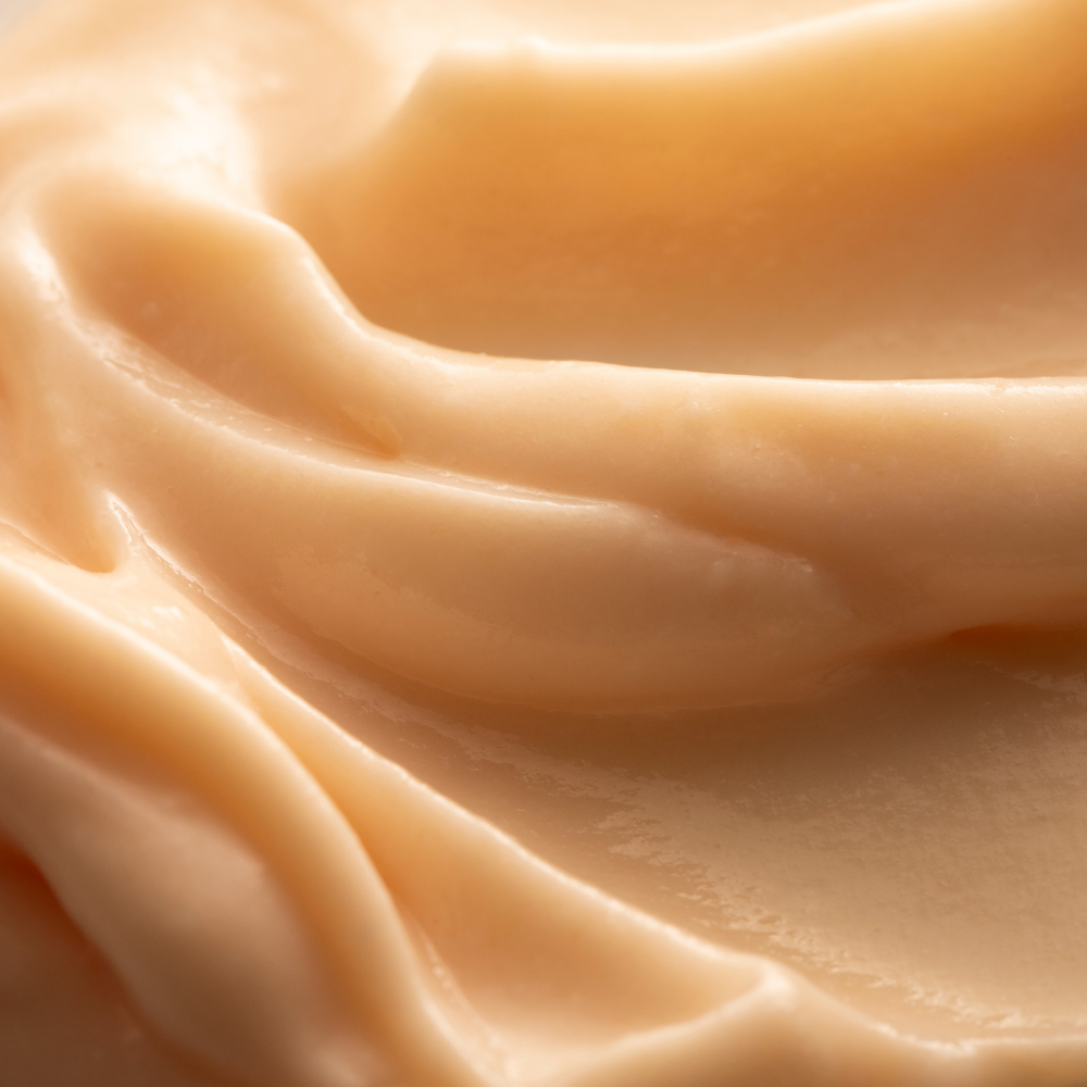 Close-up of smooth, beige fabric texture