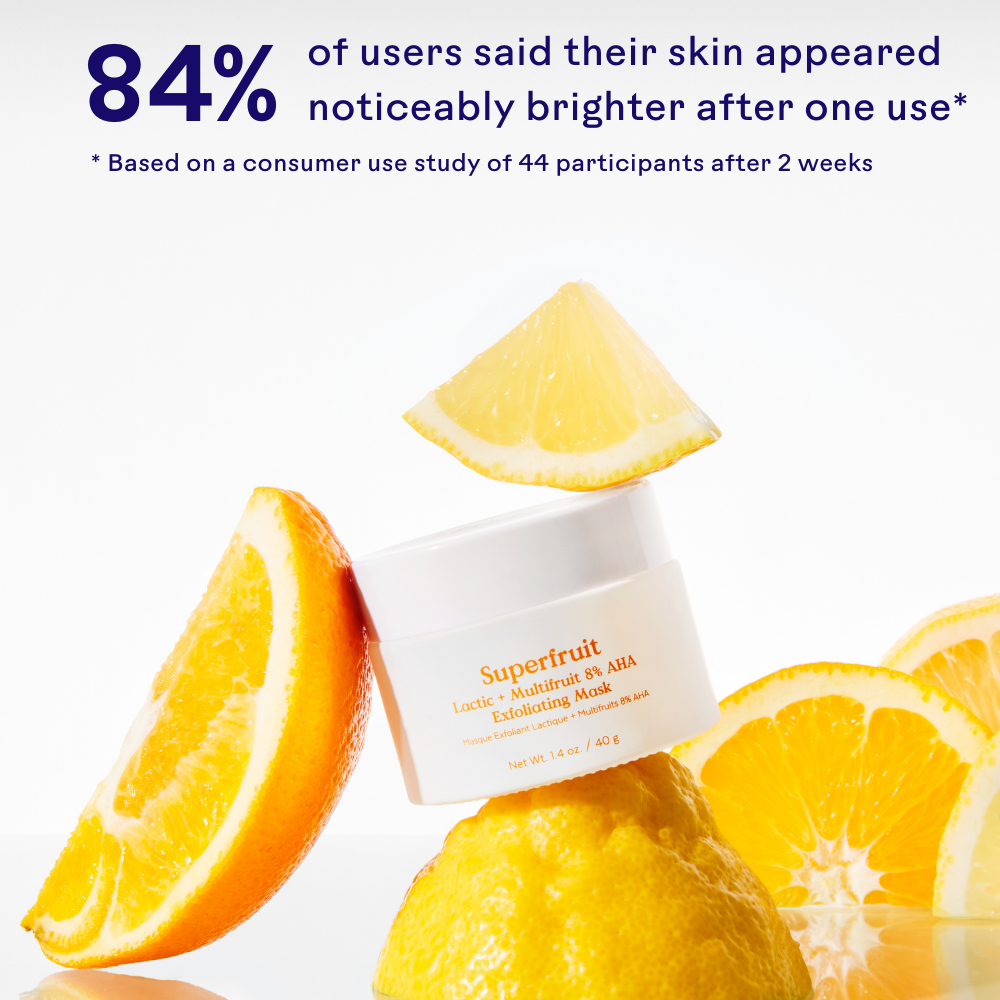 Superfruit skincare product with orange slices on a white background