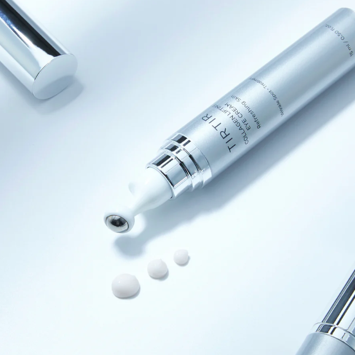Skincare product with dropper on a light blue background