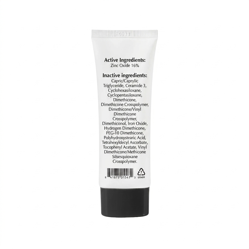 Tube of sunscreen with label showing active and inactive ingredients on a white background