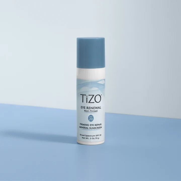 Tizo eye renewal cream bottle on a light blue background