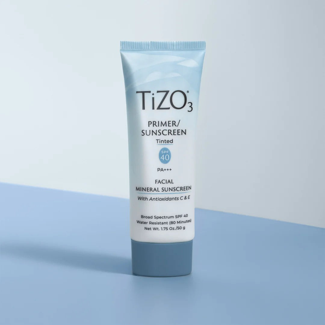Tizo 3 primer/sunscreen tube on a light blue background