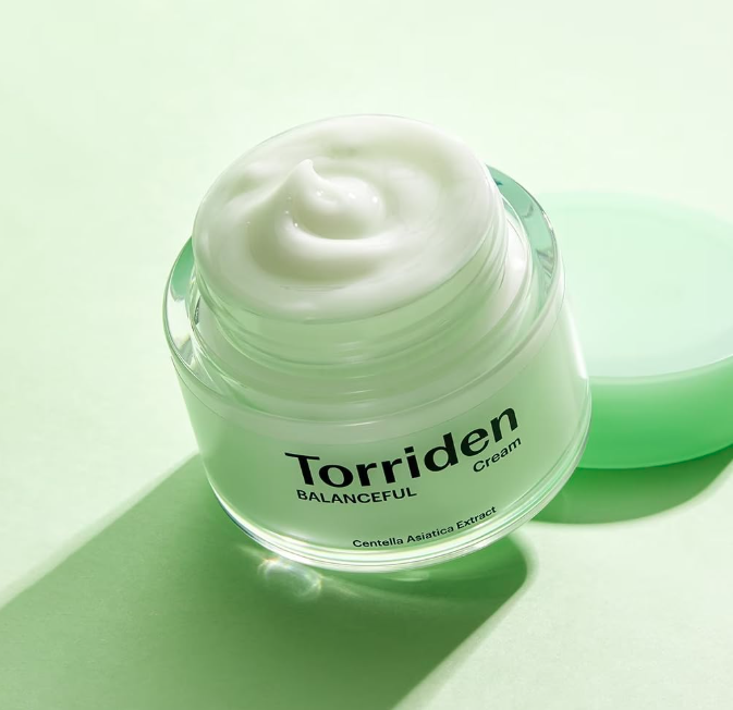 Jar of Torriden Cream on a light green background