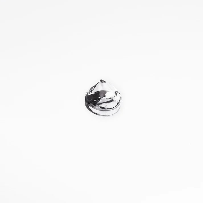 Silver ring with a teardrop-shaped design on a white background