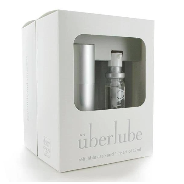 White packaging of überlube with a clear window showing the product inside.