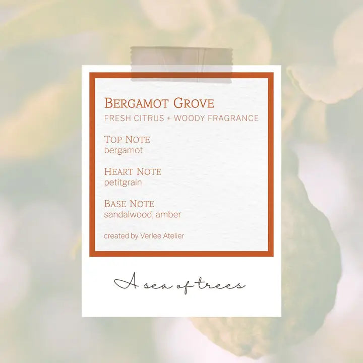 Bergamot Grove fragrance label with tree imagery in the background