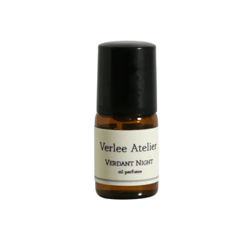 Small bottle of Verlee Atelier Verdant Night oil perfume on a white background